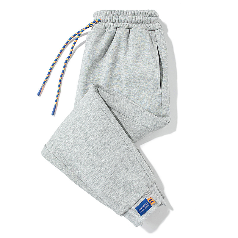 Pantalones de estilo de Hong Kong Pantalones deportivos de alta calidad para hombres pantalones de chándal de color sólido de punto pantalones casuales para hombres