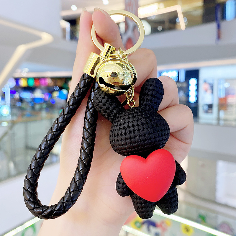 Resina creativa melocotón corazón tejido amor conejo llavero al por mayor ins pareja escuela coche llavero colgante