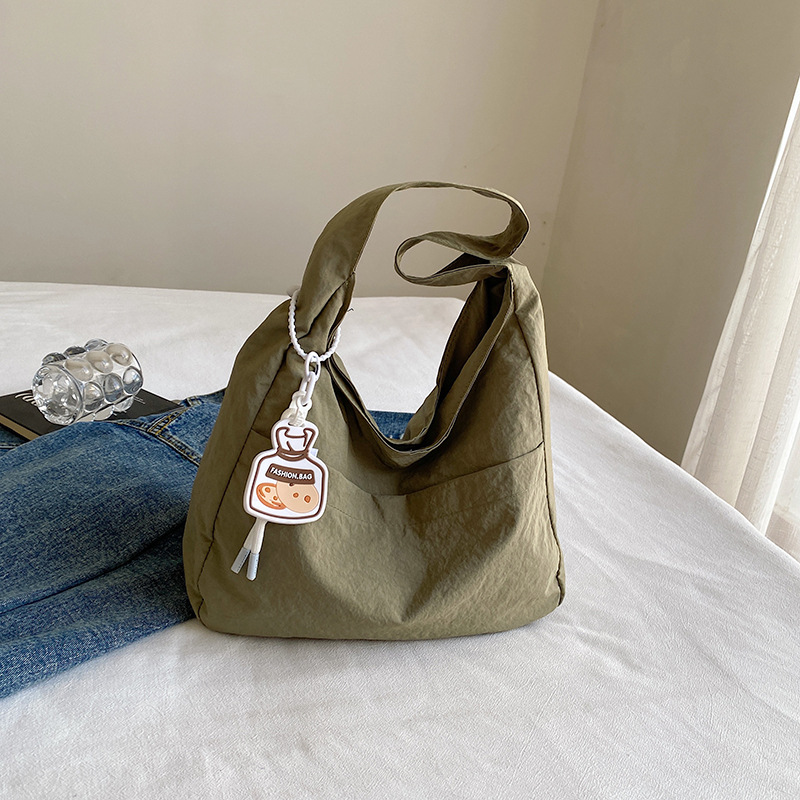 Bolsa de lona coreana ins2024 verano nueva moda ocio bolso de hombro para estudiantes universitarios