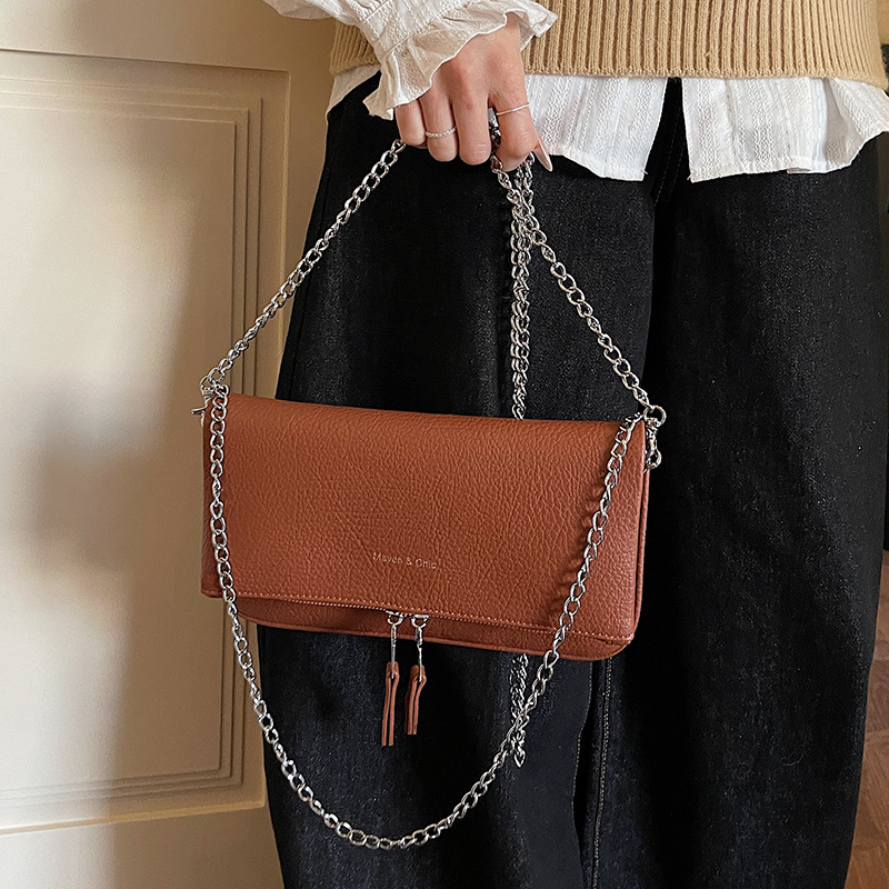 High-value fashion chain texture shoulder mochila 2026 primavera nueva bolsa casualizada coreana temperamento femenino