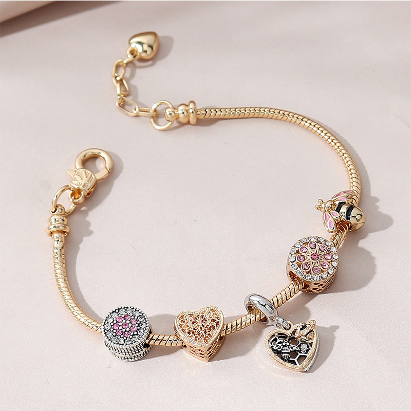 Panjia pulsera Dora DIY cuentas transfronterizas abejas goteando aceite redondo aleación de diamante adhesivo brazalete colgante en forma de corazón