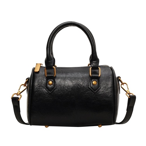 Stylish cylindrical bag for fall/winter: New European and American retro design—trendy shoulder, crossbody, and pillow-style bags for women; chic mini crossbody options.