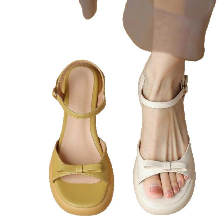 Sandalias francesas para mujeres 2026 verano nuevo estilo de moda versátil con suela gruesa con falda de una palabra con zapatos romanos para mujeres