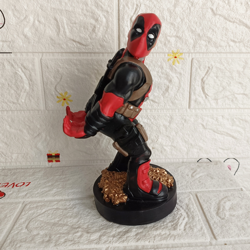 Soporte de teléfono móvil de árbol hombre de dibujos animados de escritorio veneno adornos de estudiantes adornos soporte de mango Fox negro