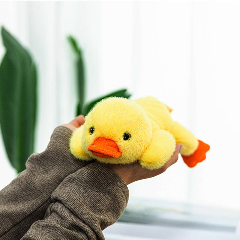 正版の熊の伝説の漫画の中で宝のぬいぐるみのぬいぐるみの子供は人形の動物のかわいい腹ばいの贈り物の卸売りに付き添います。|undefined