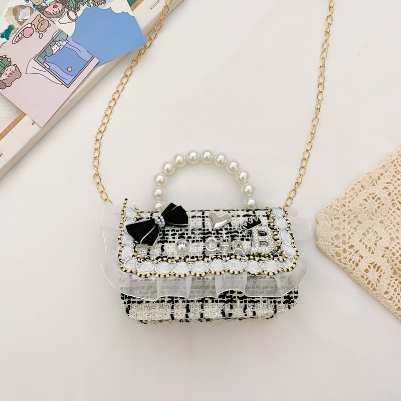 Bolso infantil, lindos arcos de perlas, bolso de mochila para niños, estilo coreano de moda, bolso de hombro para hombres y mujeres.
