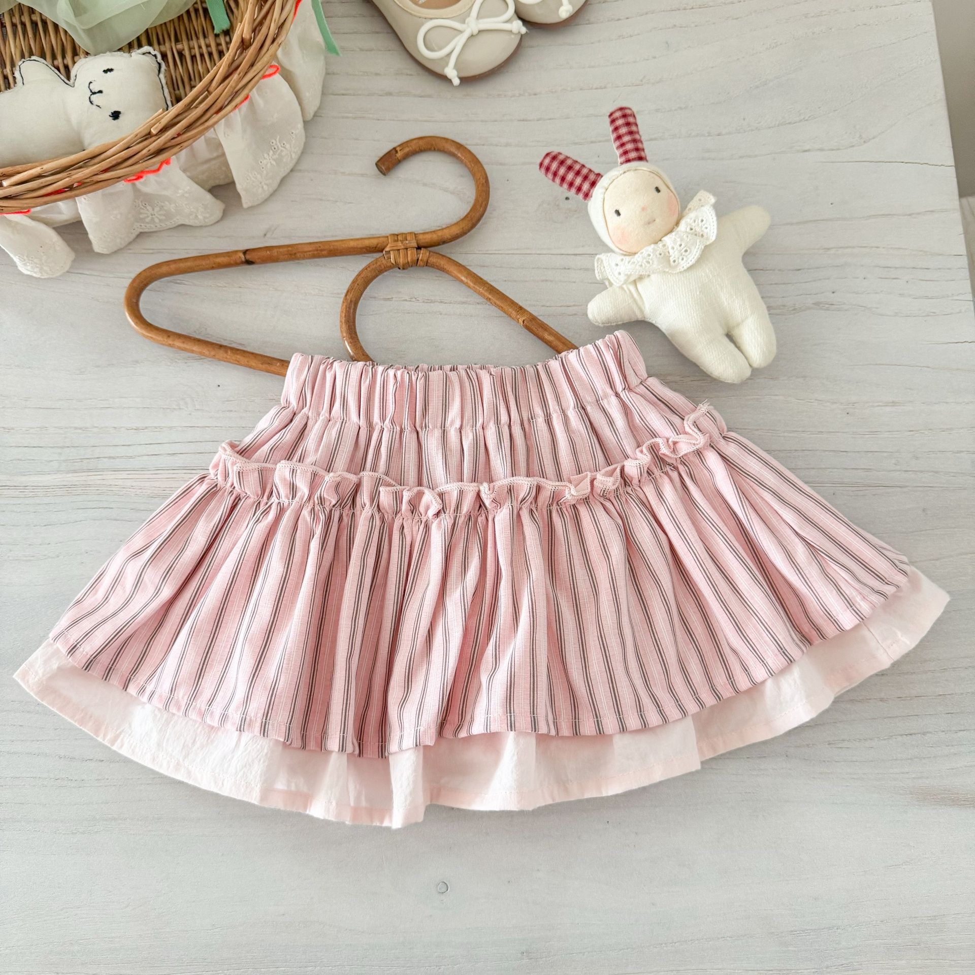Falda de siete niñas de limón salado, verano nuevo estilo, falda de estilo occidental para niños, falda corta de todo fósforo para niñas, falda de botones florales