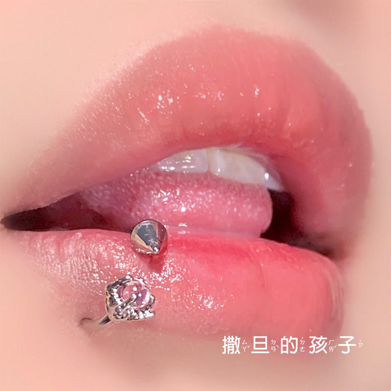 Silver pointed spike labret stud material detail