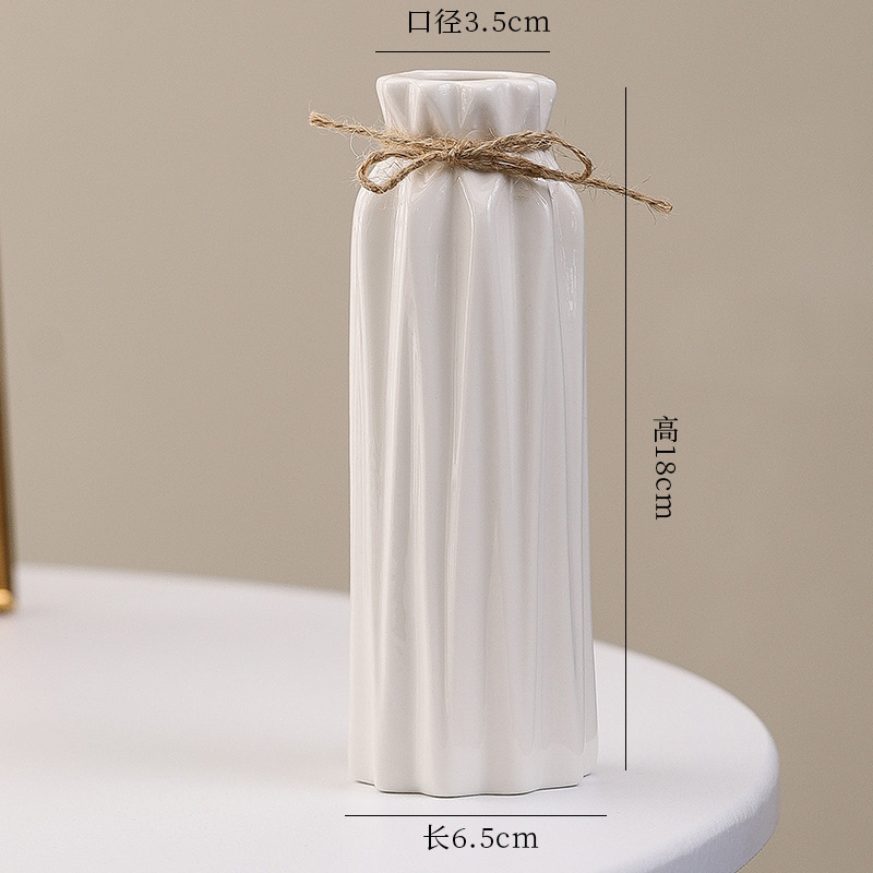 シンプルな現代の満天星陶磁器の花瓶の置物の客間の白い磁器の小さい清新な乾いた花の生け花の創意の陶磁器の花器|undefined