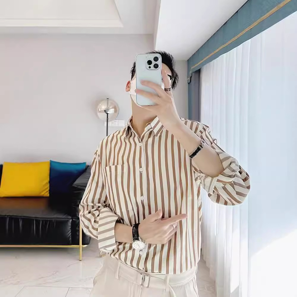 Camisa de manga larga a rayas verticales casual de negocios para hombres Camisa de primavera y otoño para hombres Camisa delgada de lujo ligero de tendencia