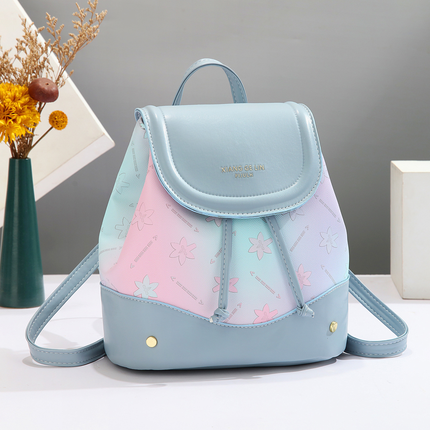 2025 nueva mochila de estilo universitario de moda de moda de impresión de moda de mujeres mochila de verano simple versátil mochila de estudiantes
