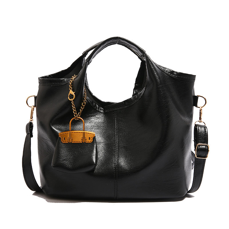 Bolsa de cubo retro 2024 nueva bolsa de hombro de gran capacidad, bolso de nicho elegante, bolso de cuero suave