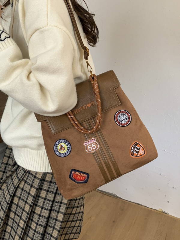 Comercio exterior insignia transfronteriza clase universidad mochila de viaje de la escuela de moda mejora la sensación de calidad retro mochila de gran capacidad
