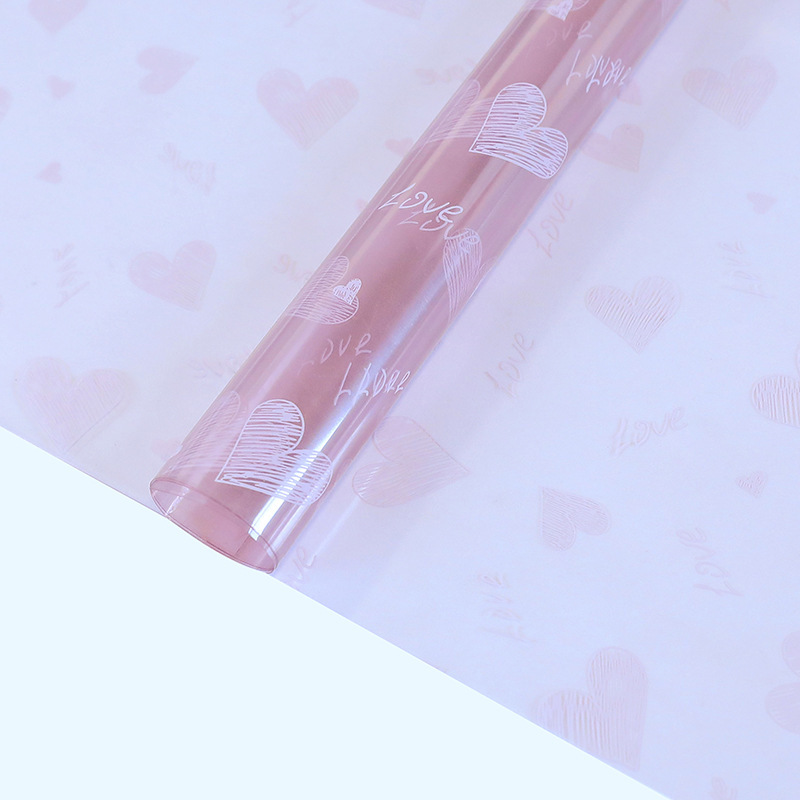 Fábrica de fiestas de flores al por mayor transfronterizo nuevo papel de vidrio amor impresa en papel de embalaje de flores transparentes