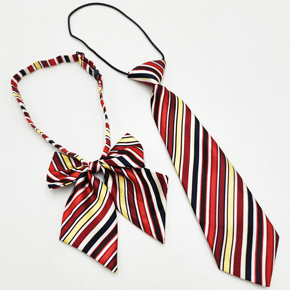 Spot de fábrica al por mayor conjunto de pajarita de corbata para niños de escuela primaria, corbata a rayas de color sólido, pajarita de raíz de plumas