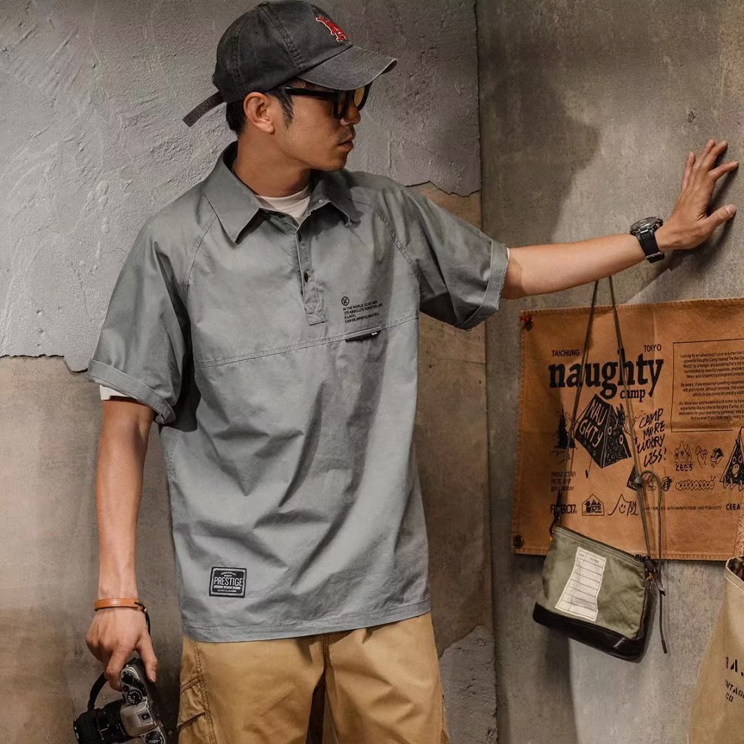 Tendencia 2024 verano nuevo estilo polo suelto de manga corta para hombre diseño de manga cinco puntos sentido tendencia camiseta de media manga