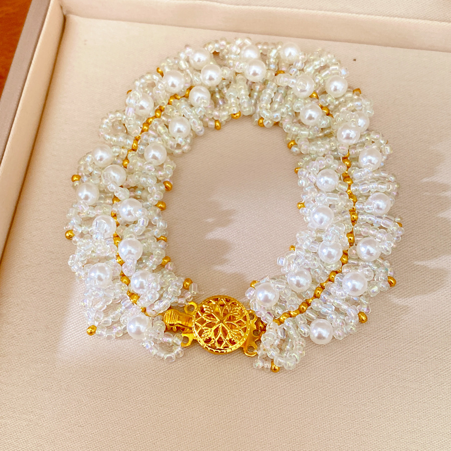 Accesorios de vacaciones pulseras de perlas ligeras de lujo nicho pulseras de alto nivel personalidad temperamento de moda joyas al por mayor