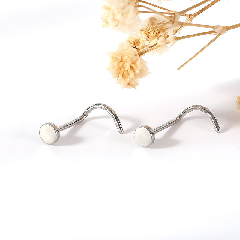 Silver pointed spike labret stud material detail