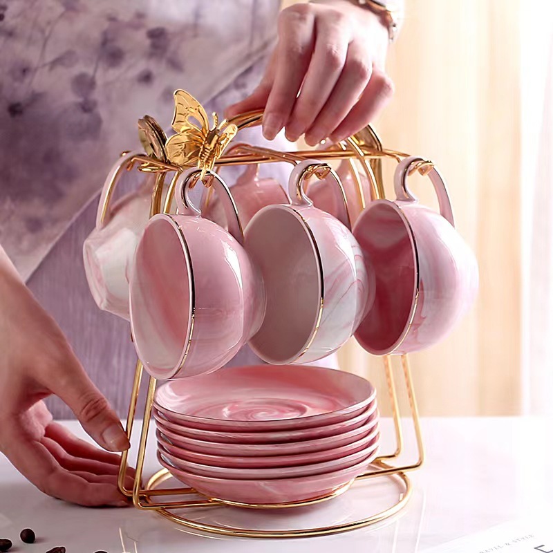 Luz de lujo taza de café traje de estilo europeo de alta apariencia taza y platillo taza de café de cerámica de alta gama exquisito juego de té de la tarde británica