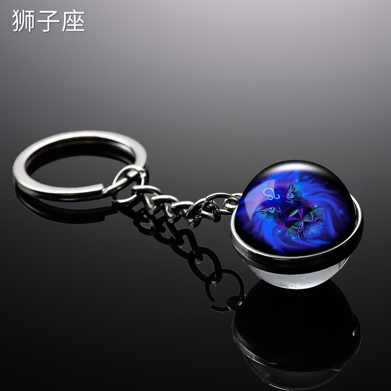 Transfronterizo 12 constelaciones de luz nocturna bolsos colgantes de bolsas de joyas de tiempo doble cara bola de vidrio llavero al por mayor