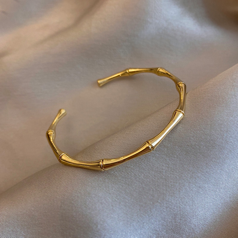 18K Gold Bamboo Titanium Steel Bracelet Simple Fashion Bracelet Ins Niche Design Korean Popular High-End Hand Jewelry for Women 18K Gold Bamboo Titanium Steel Bracelet Simple Fashion Bracelet Ins Niche Design Korean Popular High-End Hand Jewelry for Women