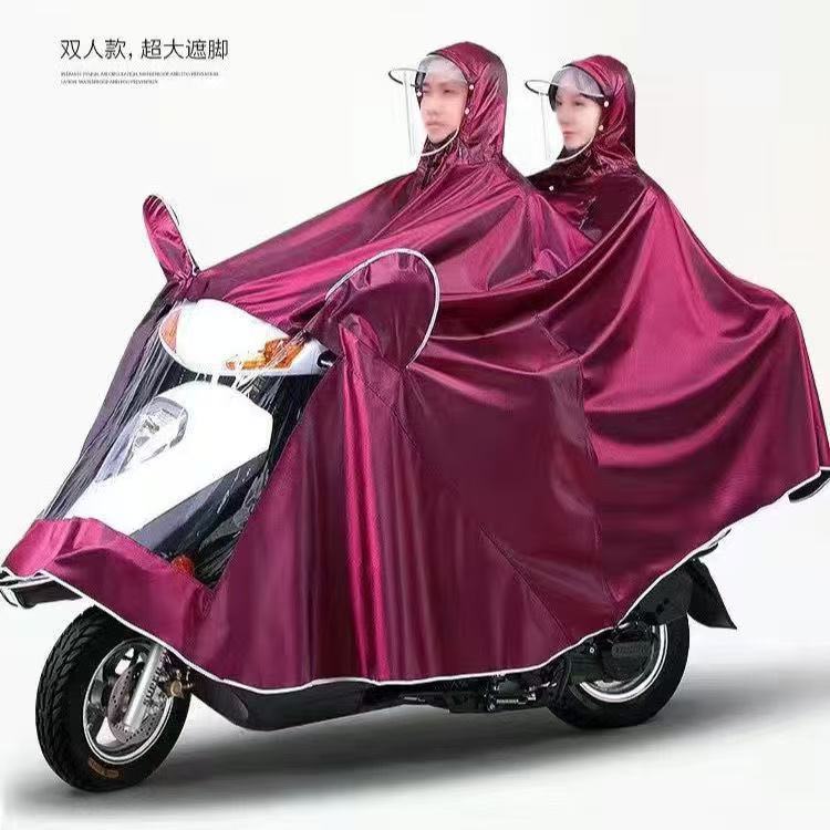Vehículo eléctrico chaqueta de lluvia aumentada chaqueta de lluvia gruesa motocicleta de doble persona un solo viaje coche de batería