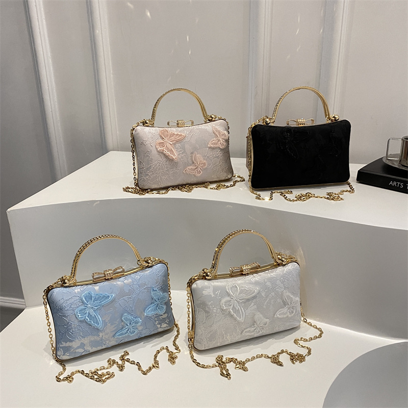 Estilo nacional transfronterizo diseño de nicho mariposa amor flor cena bolso femenino 2025 nuevo temperamento cadena bolso de mensajero