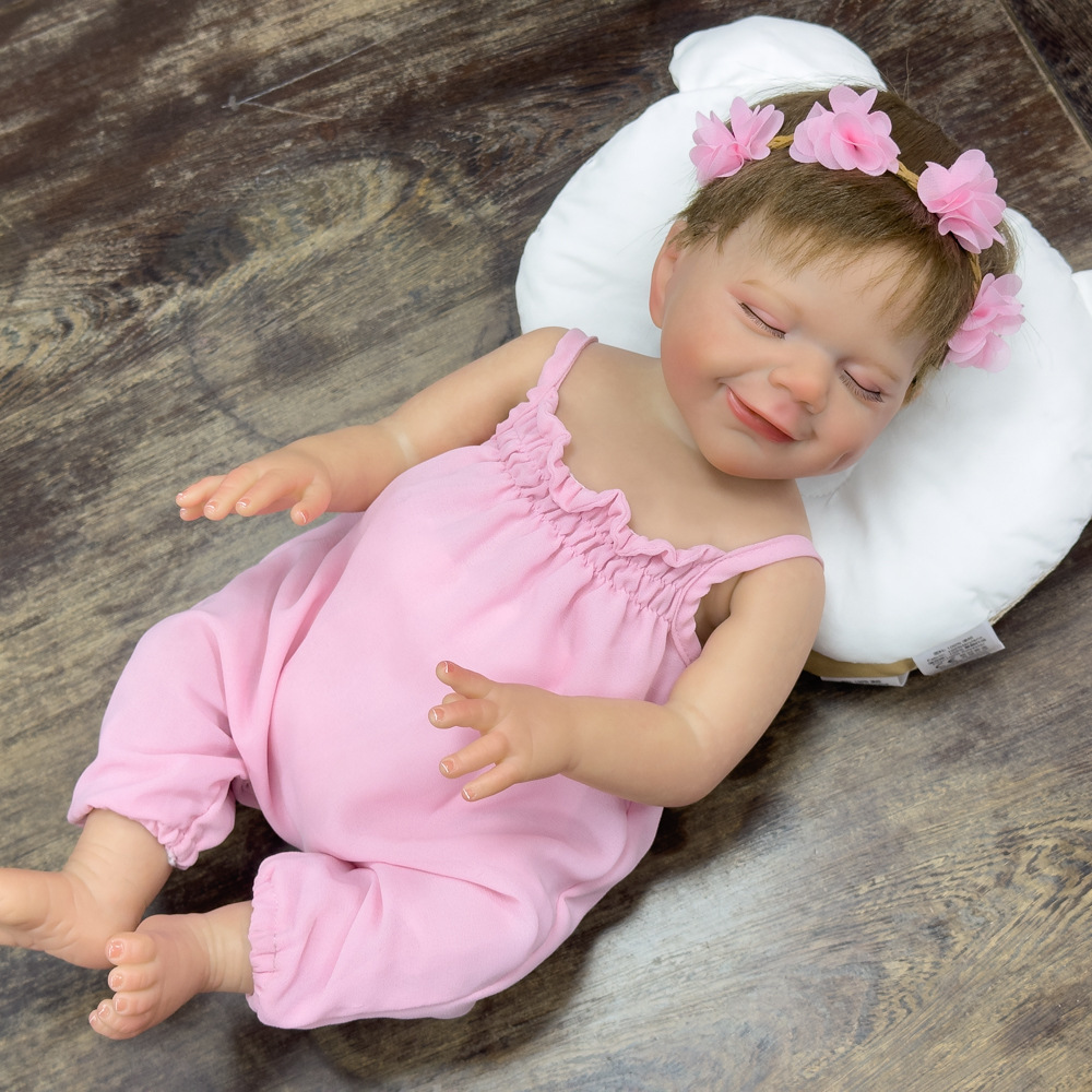 Muñeca de sueño simulación CM dormir 46 pesado bebé muñeca de goma suave muñeca cruzada fronteriza puede cambiar de Amazon Henghua