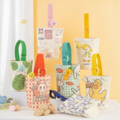 新型オリジナルins木環バケツバッグ通勤携帯アニメ小衆手持ちお土産ママがキャンバスを持っています。