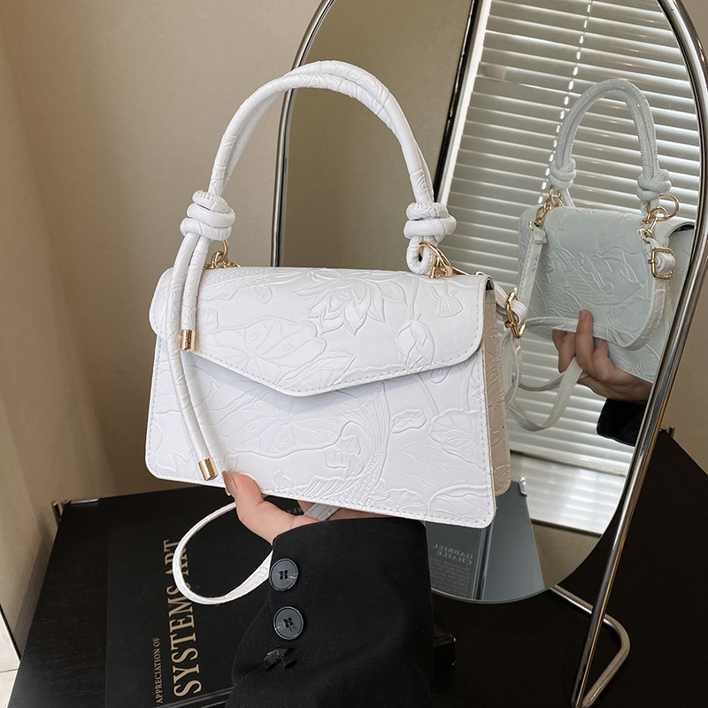 Nuevo estilo de ocio extranjero 2025 primavera de moda simple bolso de hombro flor tridimensional bolso de mochila