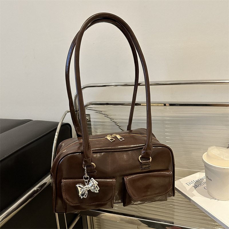 Bolsa de brazo retro para mujeres 2025 nueva textura de un solo hombro bolso de mano nicho de gran capacidad Volkswagen bolso de doble bolsillo
