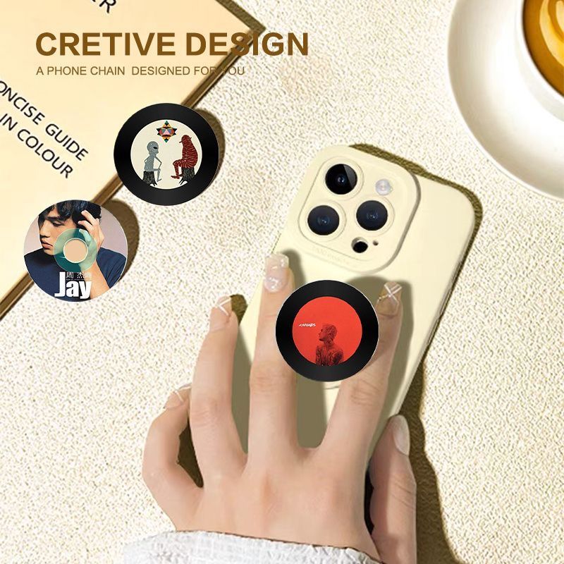 Grabación de CD vinilo redondo airbag soporte adhesivo tipo teléfono móvil adhesivo 360 ° giratorio telescópico succión magnética de corriente de marea