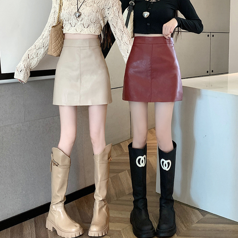 黒い小さい皮のスカートの半身のスカートの女性の秋冬の新型の高い腰はやせているpu皮のスカートを現します。|undefined
