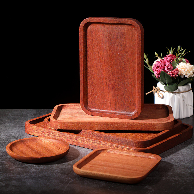 Platos de comedor occidentales Platos de comedor de sándalo negro Platos de comedor de madera maciza Paletas de madera Platos de madera Paletas creativas Platos de comedor Madera de estilo japonés