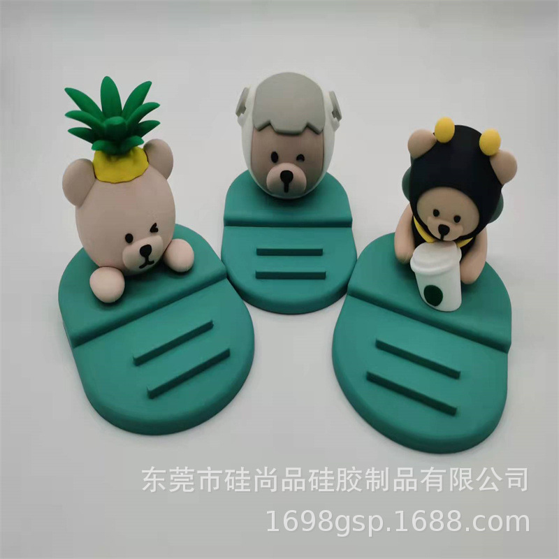 Procesamiento personalizado PVC dibujos animados muñecas animales IP imagen de escritorio soporte de teléfono móvil / caja ciega adornos animados