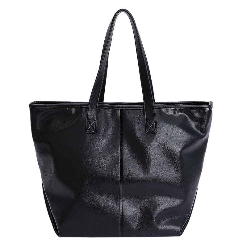 Bolsa de moda retro de gran capacidad para mujeres 2025 nueva simple versátil alta sensación de mochila de viaje diario