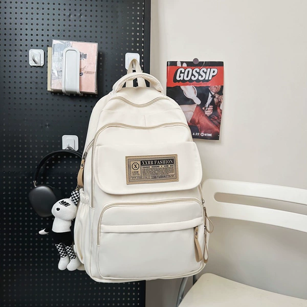 White backpack, pendant