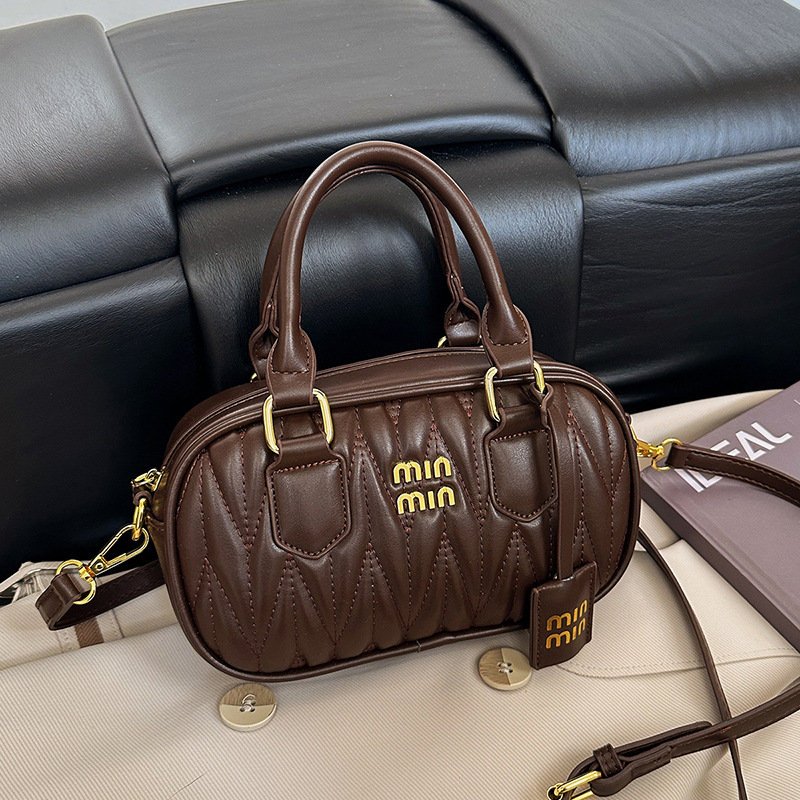 Bolso de mujer transfronterizo nuevo nicho coreano bolso de mano plegado Boston exquisito lujoso, ligero y versátil bolso de hombro.