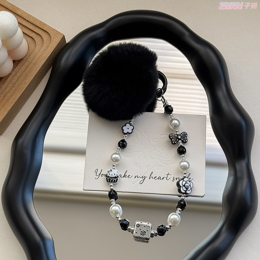Small fragrant wind mobile phone chain high sense Hepburn wind pearl accessories wholesale car keychain rabbit fur ball pendant