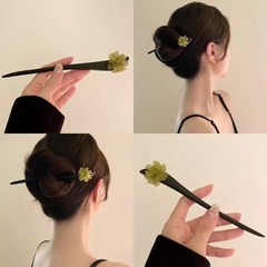 緑のツバキの花のかんざしの古風の新しい中国式の盤のかんざしの高級感のかんざしの漢服のチャイナドレスの頭飾りの工場の卸売り