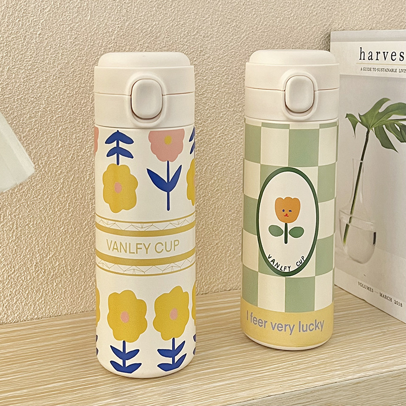 Suministro directo de fábrica taza de vacío en stock al por mayor de dibujos animados lindo flor tulipán con hebilla con paja taza de vacío