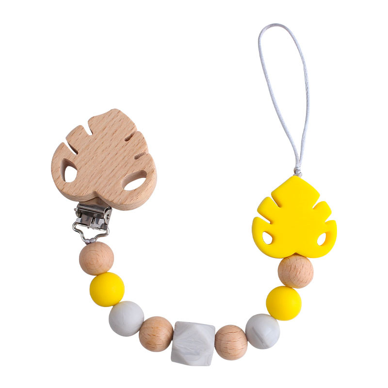 Suministros para bebés creativo clip de chupete de hoja de haya juguete mordedor bebé Cadena de chupete de hoja de silicona cadena anti-caída
