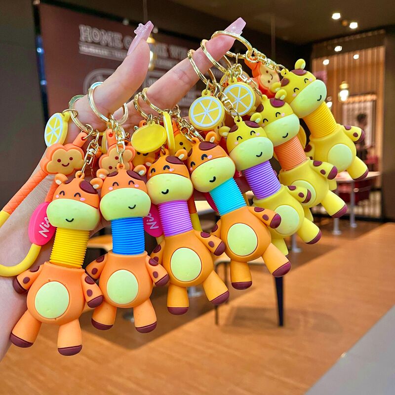 Cartoon retractable giraffe doll children's toy creative car keychain couple schoolbag pendant gift wholesale