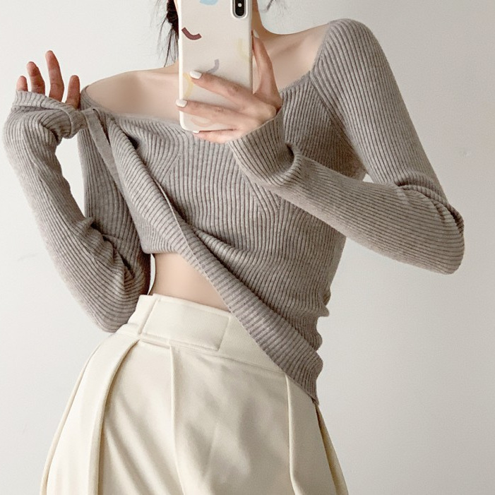 花弁襟秋冬ニット一字肩の弧の大きな襟元に気をつけて、鎖骨を露出させて痩せています。