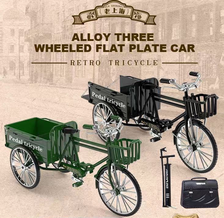Three-wheel black flatbed truck