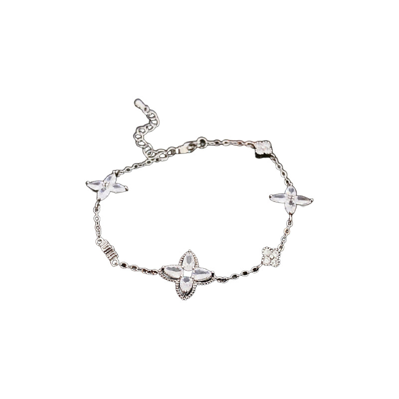 Brazalete de flores de oro real, pulsera de piedra de diamante, simple y de alto nivel, pulsera universal, nicho, lujo ligero, joyas de mano exquisitas para mujeres.