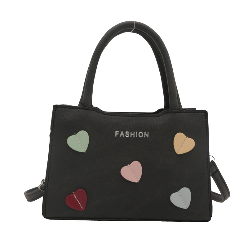 Bolso de mano de amor de la niña para mujeres 2024 nuevo bolso de hombro de verano de alta calidad sensación de super caliente bolso universal