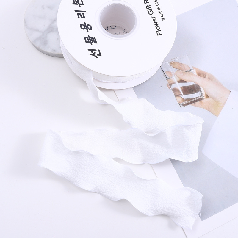 Nueva ola cinta plisada espina de pescado cinturón de hilo de oreja flor tienda de flores embalaje cinta pastel hornear cinturón de tela floral