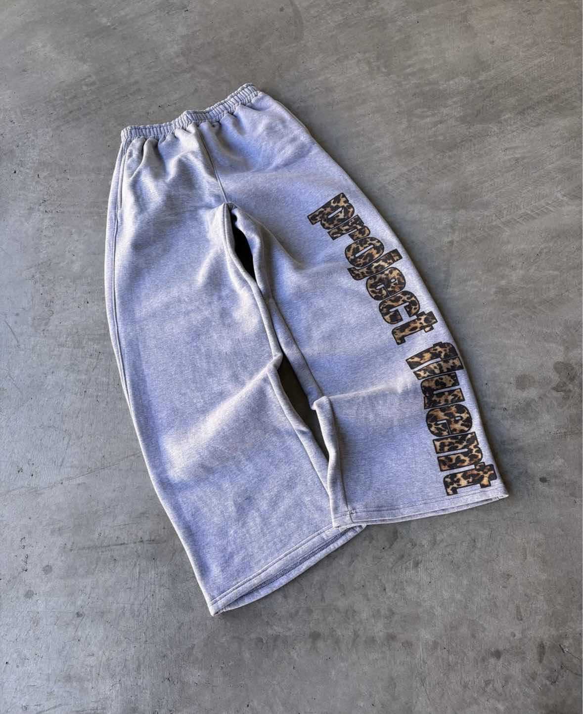 2026 Europe And The United States New Viral Trends Fashion Retro Versatile Casual Trousers Men And Women Street Leopard Print Loose Sweatpants_viptrois.com