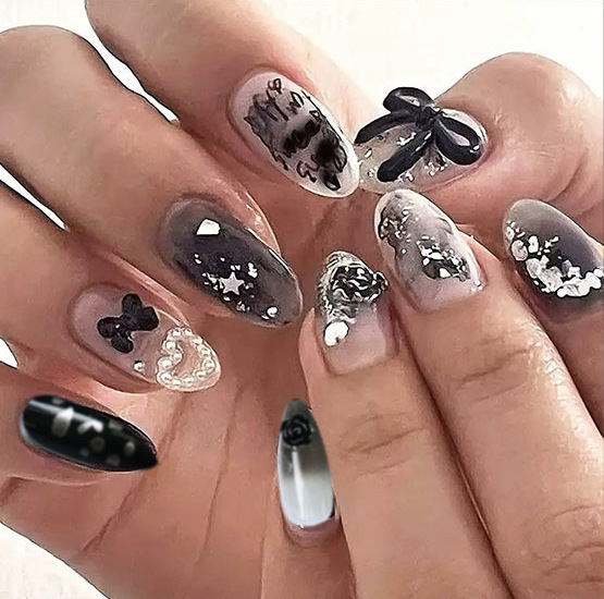 Black Three-Dimensional Bowknot Nail Art with Pearls, Hearts, Stars, Gradient Glitter, and Almond-Shaped Nail Pieces Black Three-Dimensional Bowknot Nail Art with Pearls, Hearts, Stars, Gradient Glitter, and Almond-Shaped Nail Pieces